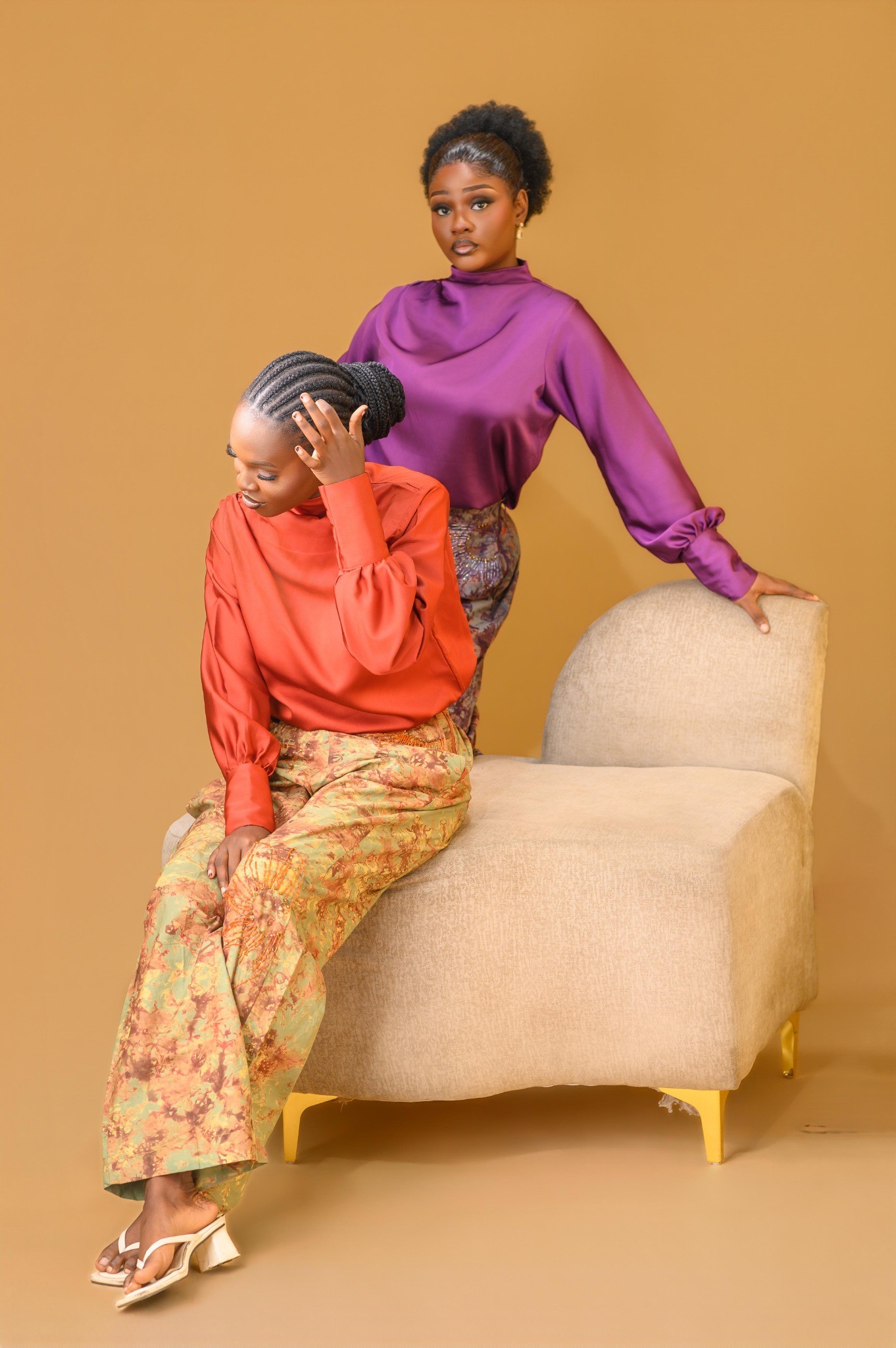 Ladies wearing the Estelle set in Maroon and Orange colour