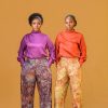 Two ladies wearing the Estelle set in Maroon and Orange colour