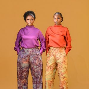 Two ladies wearing the Estelle set in Maroon and Orange colour